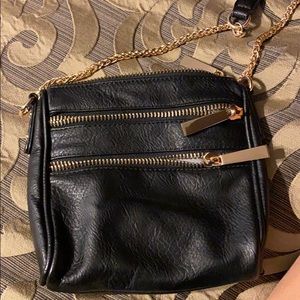black and gold purse